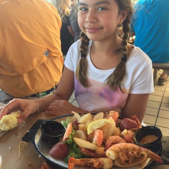 Cantler's Riverside - Jamie is an about to dig in - Seafood Near Me - Annapolis, Maryland