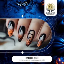 Organic - Ghosts and bats flying in perfect style! Cute, spooky, and ready to steal the Halloween spotlight.
 Tap to reserve your spooky mani!
