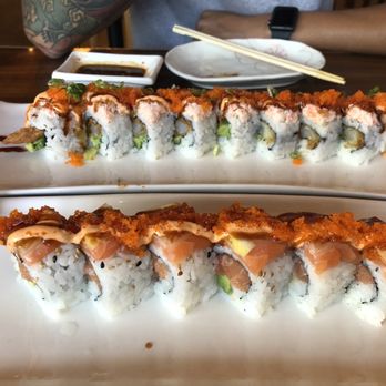 Sushi Park - two plates of sushi with chopsticks - Sushi Bars Near Me - Oakland, California Sushi Park - two plates of sushi with chopsticks - Sushi Bars Near Me - Oakland, California