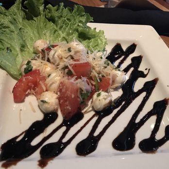 BJ's Restaurant & Brewhouse - Tomato and mozzarella balsamic salad - New American Near Me - Laurel, Maryland BJ's Restaurant & Brewhouse - Tomato and mozzarella balsamic salad - New American Near Me - Laurel, Maryland