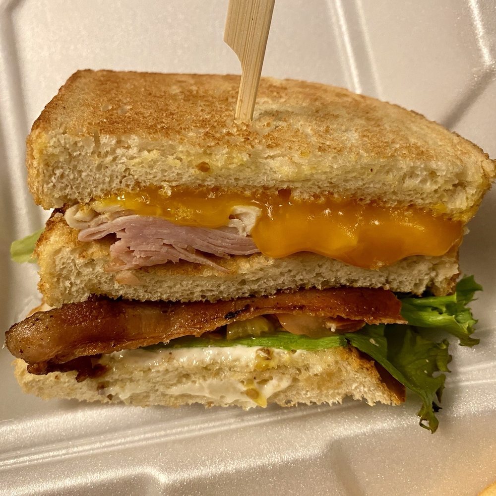 Express Cafe - Club sandwich, i swapped swiss for cheddar, not knowing it would be melted. - Breakfast & Brunch Near Me - Meridian, Idaho Express Cafe - Club sandwich, i swapped swiss for cheddar, not knowing it would be melted. - Breakfast & Brunch Near Me - Meridian, Idaho