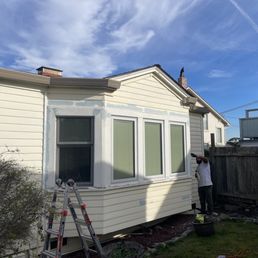 Before picture - caulking windows, and paint