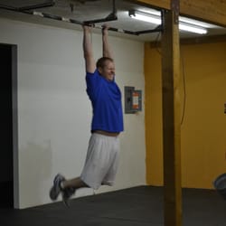 Tim working on his kipping pull-ups.