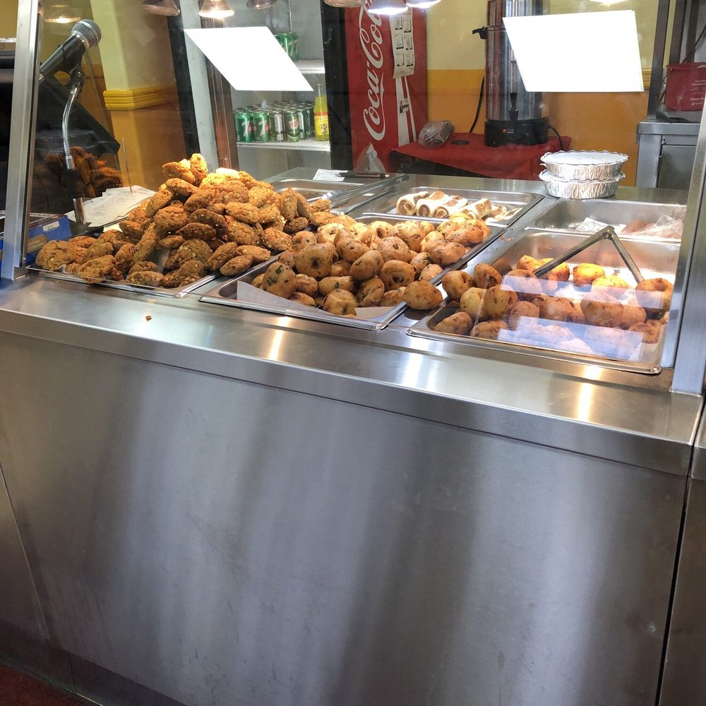 Thinusha - a variety of pastries in a display case - Sri Lankan Near Me - Brampton, Ontario Thinusha - a variety of pastries in a display case - Sri Lankan Near Me - Brampton, Ontario