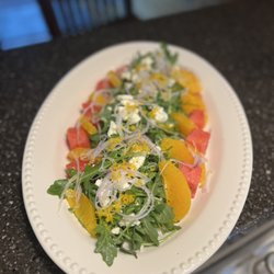 Watermelon,feta and arugula salad with citrus vinaigrette.