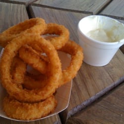 Hot, crisp, non-greasy onion rings with a side of mayo
