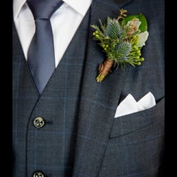 Green boutonniere by Anna Held