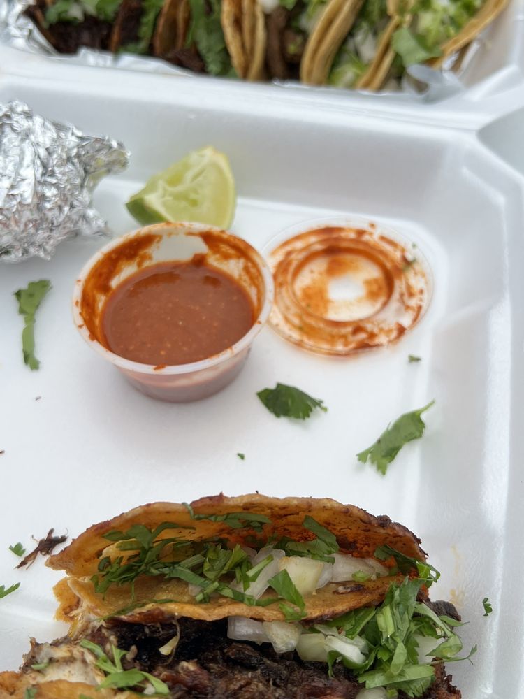 El Tacorriendo Logo