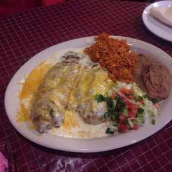 Poco & Moms - Two chili rellenos with sour cream and green chili!!! - American Near Me - Tucson, Arizona