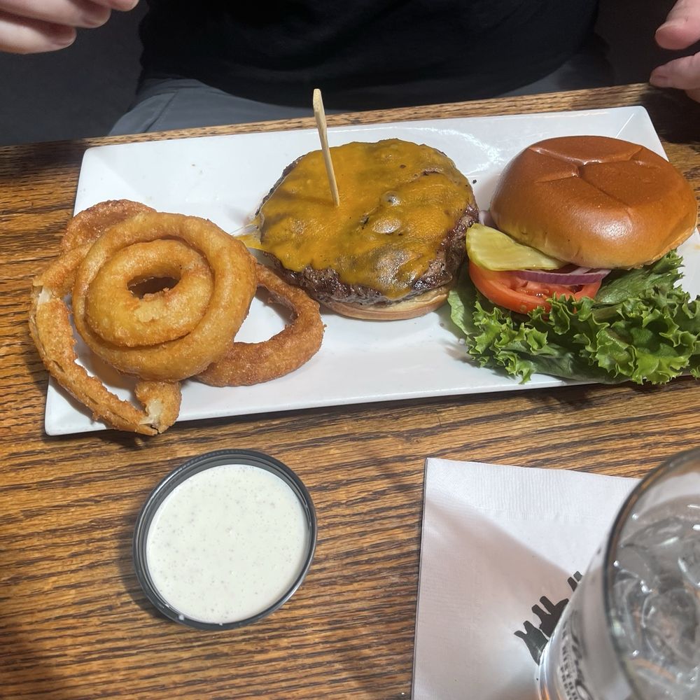 The Palace - Backcountry burger with cheddar cheese and onion rings - Bars Near Me - Prescott, Arizona The Palace - Backcountry burger with cheddar cheese and onion rings - Bars Near Me - Prescott, Arizona