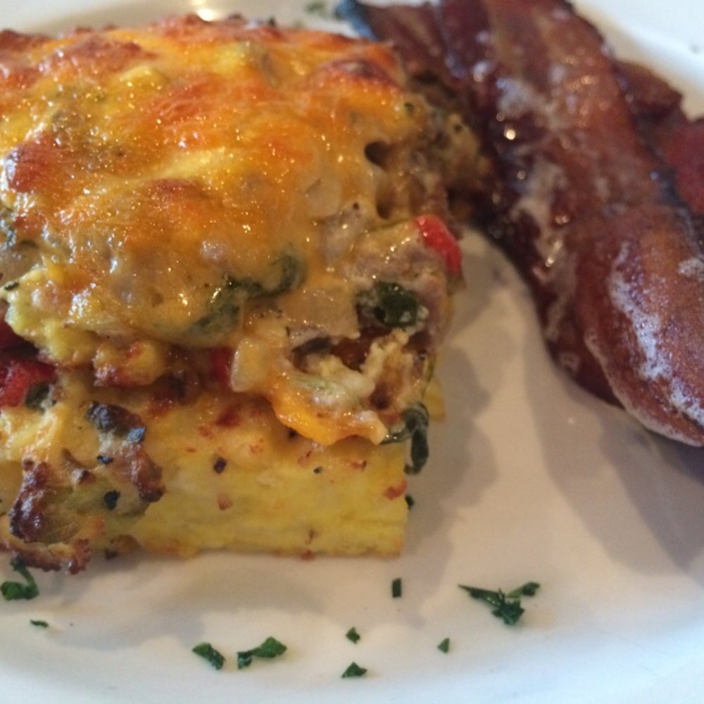 Otto's - Egg casserole with a side of bacon - Breakfast & Brunch Near Me - Covington, Kentucky Otto's - Egg casserole with a side of bacon - Breakfast & Brunch Near Me - Covington, Kentucky