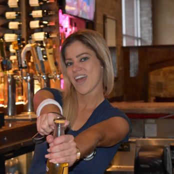 Whiskey Jax - Skylar behind the bar - Bars Near Me - Jacksonville, Florida