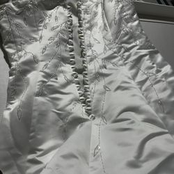 Turned a wedding gown from zipper bag to corset back.