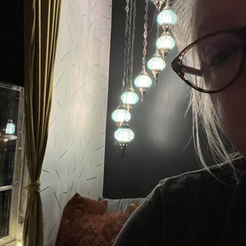 Tiny House - This little double seat and light are a lovers dream. Get close and enjoy your drink. - Cocktail Bars Near Me - Omaha, Nebraska
