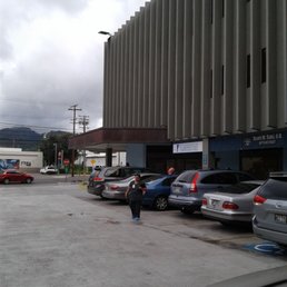 Across from Chevron gas station, next to Jack in the Box.
