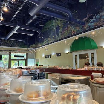 Sushiville - shoes the artwork on the restaurant wall and the sushi belt - Sushi Bars Near Me - Gresham, Oregon Sushiville - shoes the artwork on the restaurant wall and the sushi belt - Sushi Bars Near Me - Gresham, Oregon