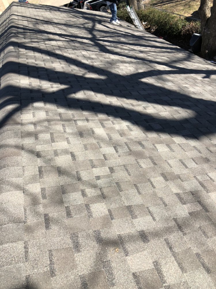 Slide of Erik's Roofing