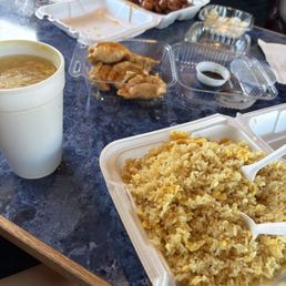 Egg fried rice, egg flour soup, pot stickers, orange chicken. Egg fried rice, egg flour soup, pot stickers, orange chicken.