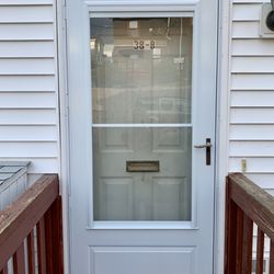 New brick molding and storm door.