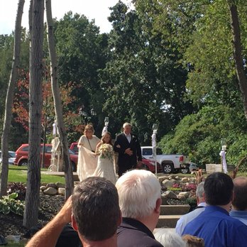 Mueller's Orchard and Cider Mill - a bride and groom walking down the aisle - Fruits & Veggies Near Me - Linden, Michigan Mueller's Orchard and Cider Mill - a bride and groom walking down the aisle - Fruits & Veggies Near Me - Linden, Michigan