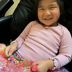 Longevity Acupuncture - A four year old cutie pie receiving acupuncture in such joy