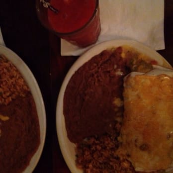 The Mont - Green chili burrito minus the green chili sauce with a side of refried beans and rice - Bars Near Me - Norman, Oklahoma The Mont - Green chili burrito minus the green chili sauce with a side of refried beans and rice - Bars Near Me - Norman, Oklahoma