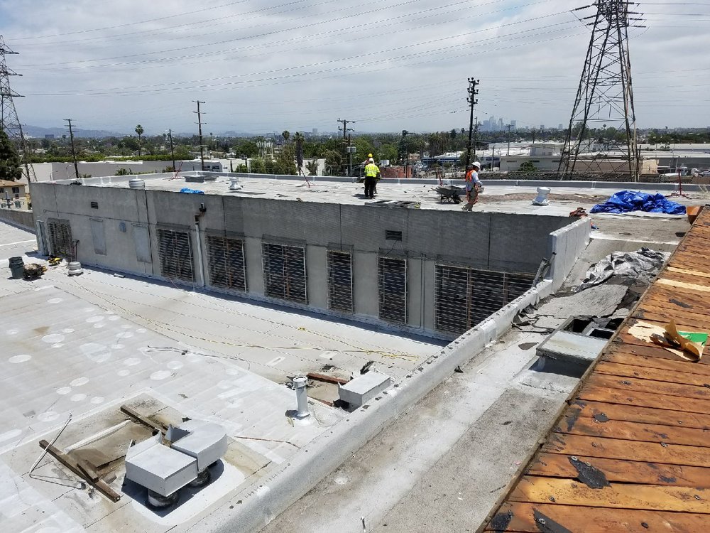 Slide of Tip Top Roofing