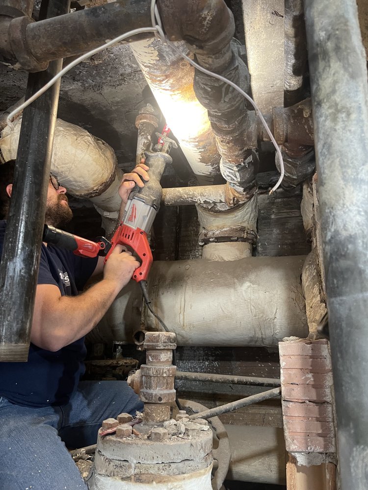 Slide of E & E Mechanical Services