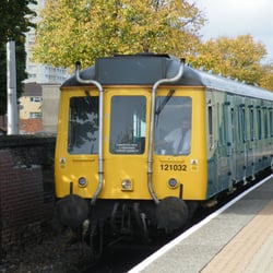 Cardiff Bay Railway Station - Old diesel train on the shuttle service from Cardiff Queen Street arrives at Cardiff Bay.