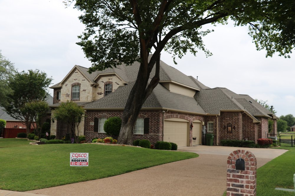 Slide of Coxco Roofing