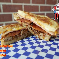 Dizzy Izzy's Food Truck - Colby-Jack Cheese, Smoked Pulled Pork, Grilled Ham, Crispy Bacon, Home-Made BBQ Sauce