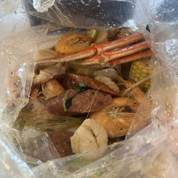 Mr Crab Seafood Boils - Inside: Scallops, Head on shrimp, snow crab, corn and sausage - Seafood Near Me - Sparks, Nevada Mr Crab Seafood Boils - Inside: Scallops, Head on shrimp, snow crab, corn and sausage - Seafood Near Me - Sparks, Nevada