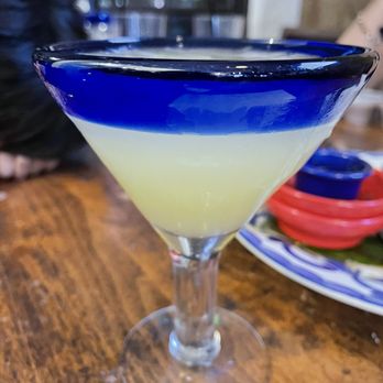 El Torito - a blue and white martini glass on a wooden table - Mexican Near Me - Northridge, California El Torito - a blue and white martini glass on a wooden table - Mexican Near Me - Northridge, California