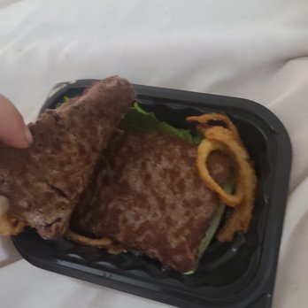 Wendy's - a sandwich in a plastic container - Burgers Near Me - Kissimmee, Florida Wendy's - a sandwich in a plastic container - Burgers Near Me - Kissimmee, Florida