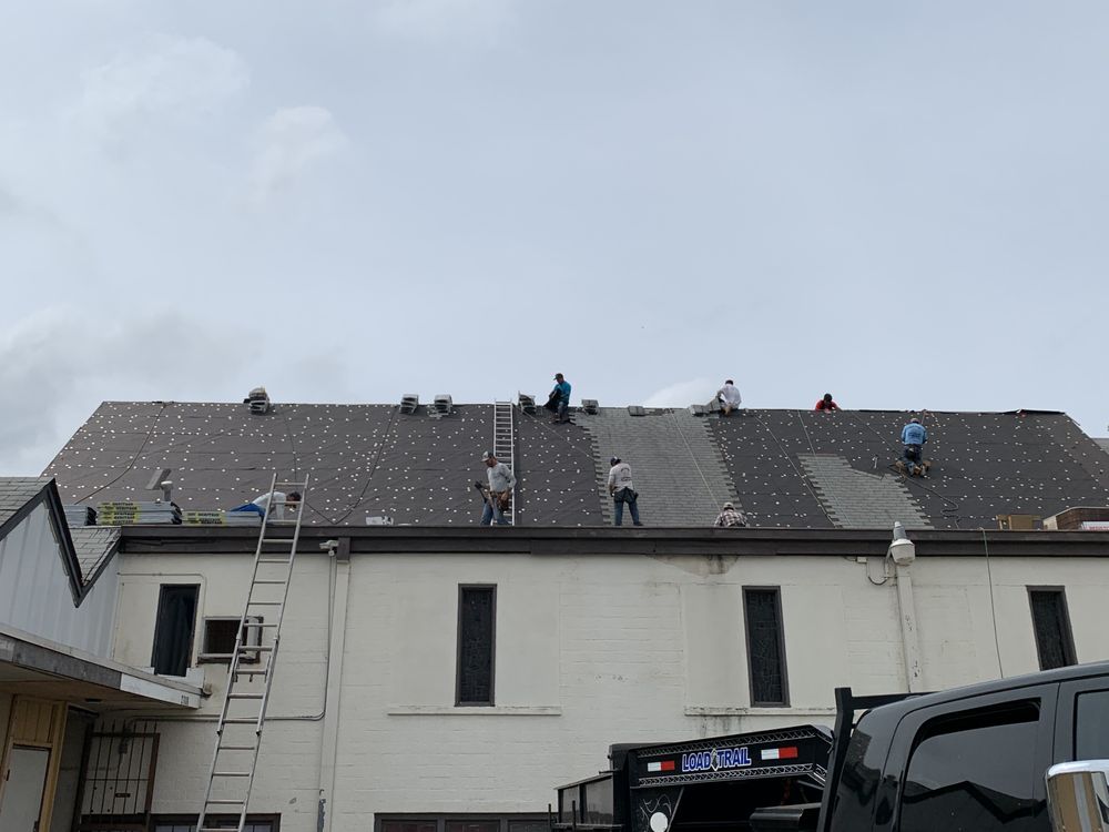 Slide of Trinity Roofing & Restoration