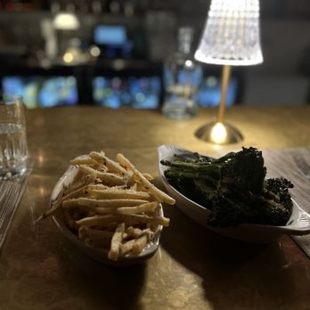 Patton's Steakhouse - a plate of fries and broccoli - Steakhouses Near Me - Houston, Texas