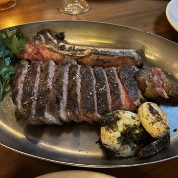 The Chicago Firehouse Restaurant - 24oz bone in ribeye - with two shrimp added - medium rare - Steakhouses Near Me - Chicago, Illinois The Chicago Firehouse Restaurant - 24oz bone in ribeye - with two shrimp added - medium rare - Steakhouses Near Me - Chicago, Illinois