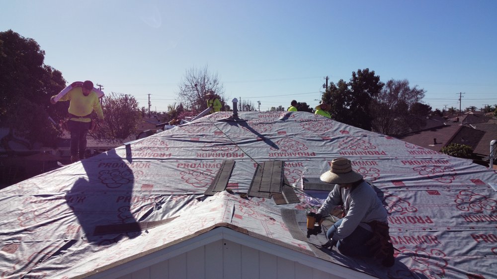Slide of Home Town Roofing