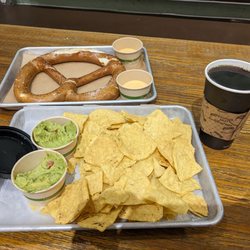 West Wall Bar - Chips and guacamole, pretzel with cheese (normally has one cheese one mustard but it's too spicy for the kids), and drip coffee.
