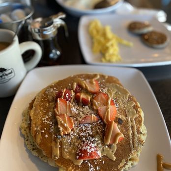 Canopy Road Cafe - Elvis pancakes: pancakes with bananas and peanut butter chips, topped w bacon that I swapped for strawberries - American Near Me - Jacksonville, Florida Canopy Road Cafe - Elvis pancakes: pancakes with bananas and peanut butter chips, topped w bacon that I swapped for strawberries - American Near Me - Jacksonville, Florida