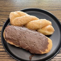 Glazed twist and cream filled long john Glazed twist and cream filled long john