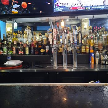 Downriver Bar and Grill - a basketball game on television - Bars Near Me - Ecorse, Michigan