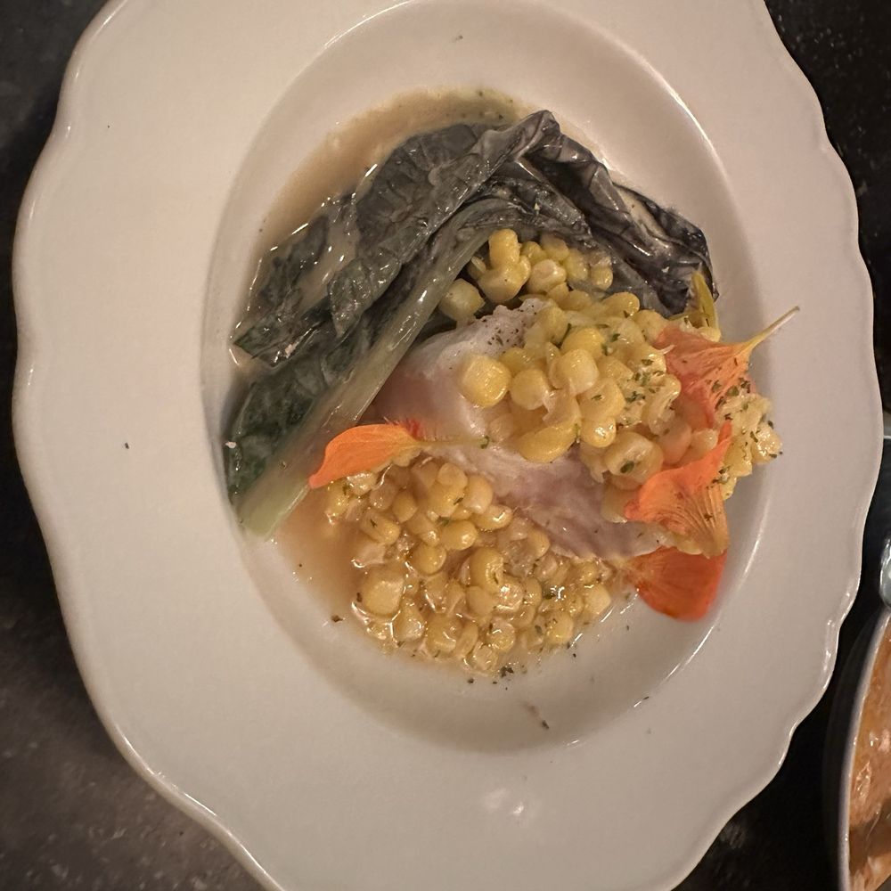 Apollo Bar - Poached cod with corn and nasturtium - Breakfast & Brunch Near Me - København Apollo Bar - Poached cod with corn and nasturtium - Breakfast & Brunch Near Me - København