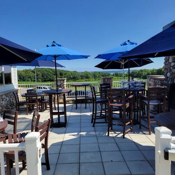 Hawthorne Vineyards - tables and umbrellas on patio - Wineries Near Me - Traverse City, Michigan Hawthorne Vineyards - tables and umbrellas on patio - Wineries Near Me - Traverse City, Michigan