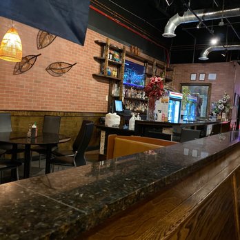 Viet Chopsticks - a bar with tables and chairs - Vietnamese Near Me - Woodbridge, Virginia
