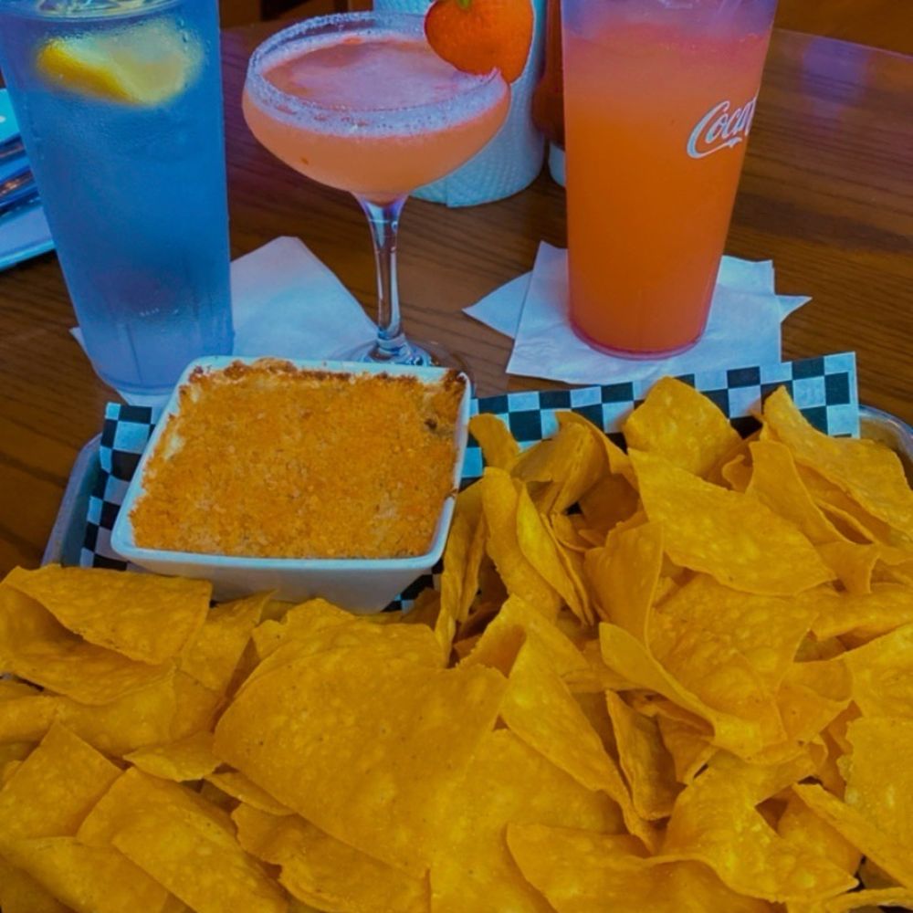 Hickory Tavern - Spinach artichoke dip w/Chips and a Strawberry Martini - Sports Bars Near Me - Rock Hill, South Carolina