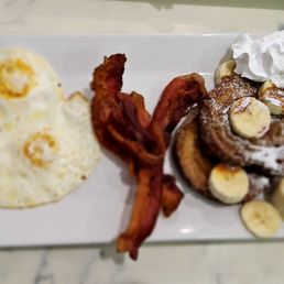 2 eggs, bacon, and French toast (churro style for a few bucks more) 2 eggs, bacon, and French toast (churro style for a few bucks more)