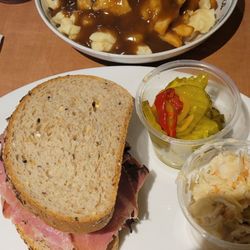 Burger Hub & Grill - Small poutine and smoked Meat sandwich h