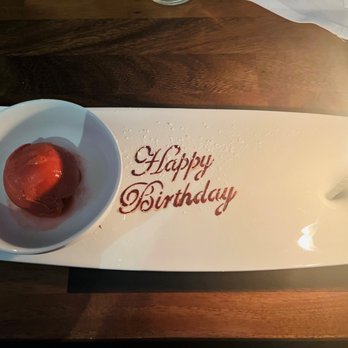 Chapeau - Birthday candle with raspberry sorbet. - French Near Me - San Francisco, California Chapeau - Birthday candle with raspberry sorbet. - French Near Me - San Francisco, California