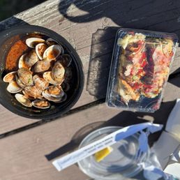 Steamed Clams and hot lady roll. Steamed Clams and hot lady roll.